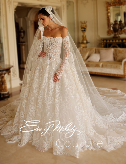 Elegant bridal gown with lace details.